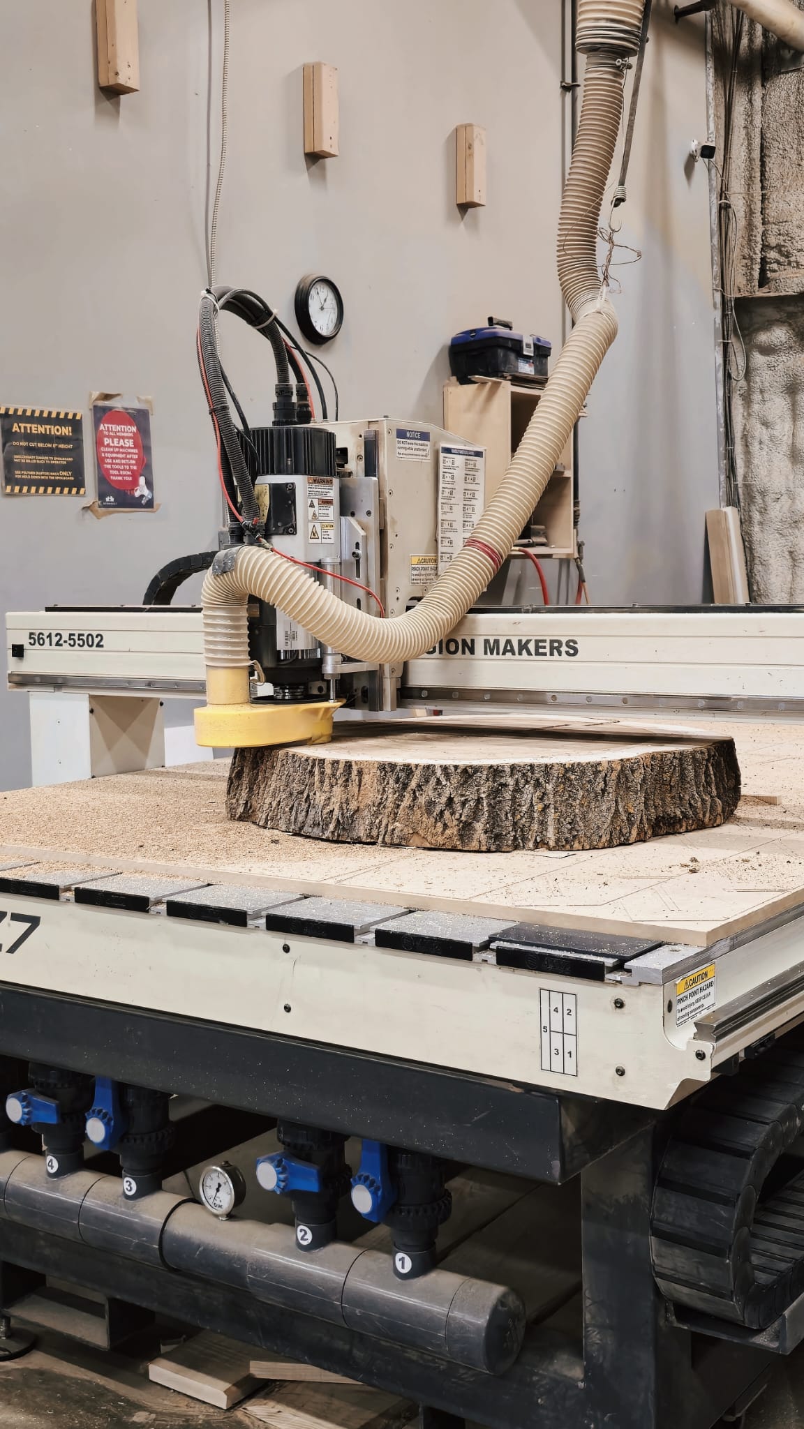 NewMakeIt AXYZ CNC router cutting a wood slab